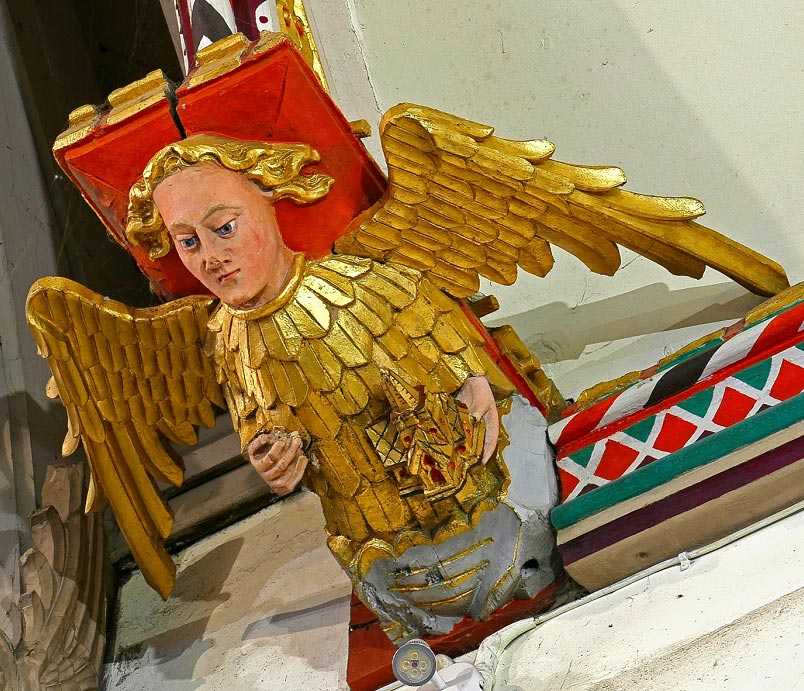 Next to Rood Screen: Angel holding reliquary