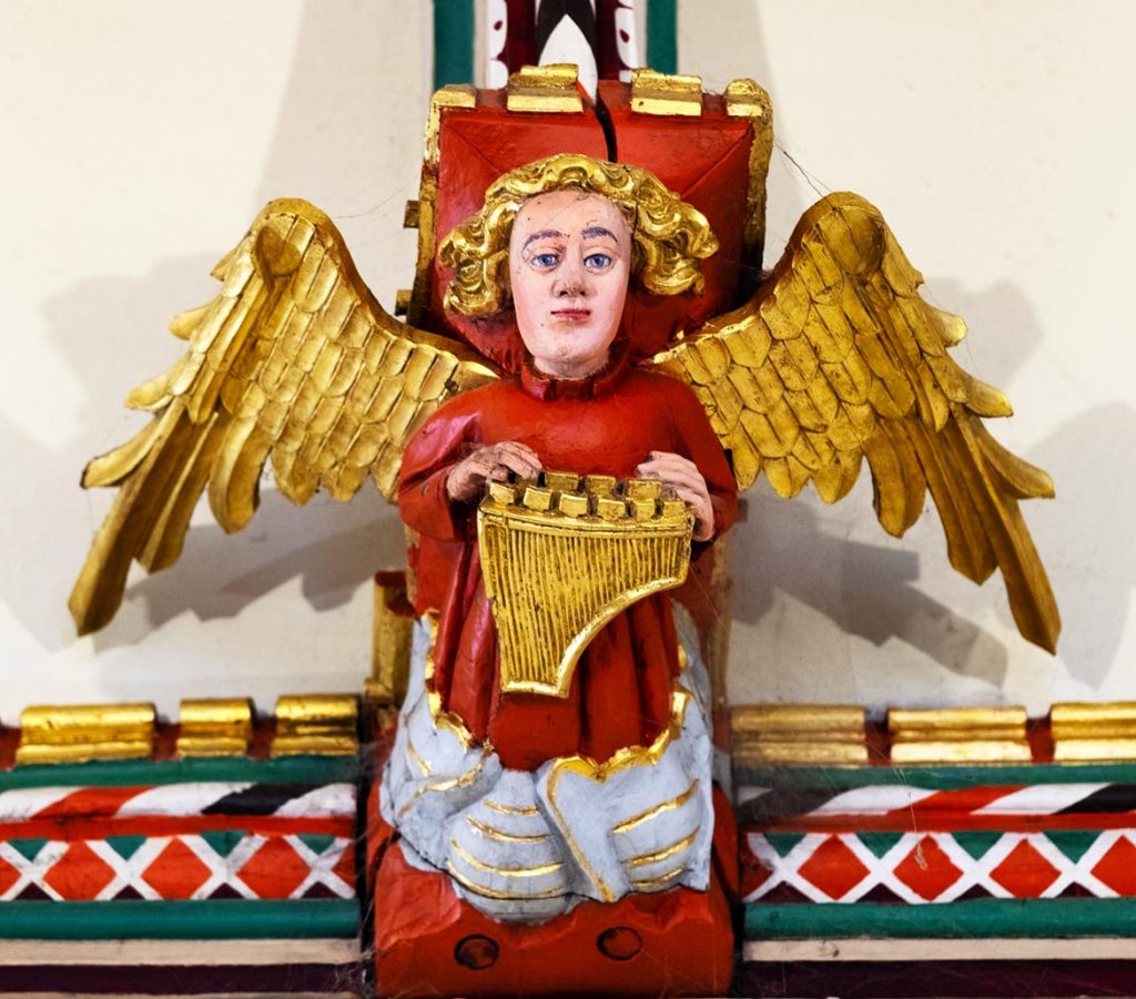 Angel playing harpsichord
