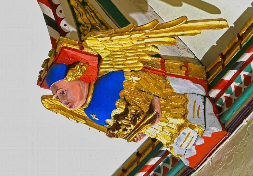 Angel holding a crown