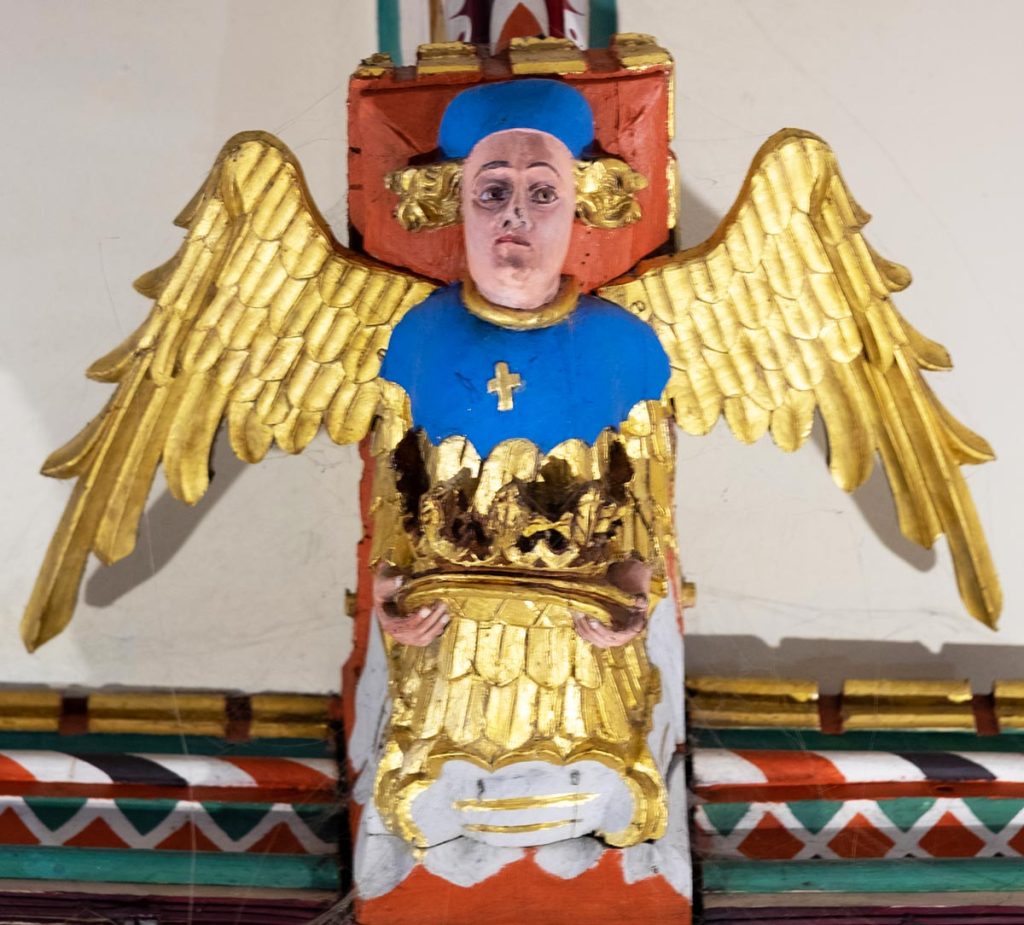 Angel holding a crown