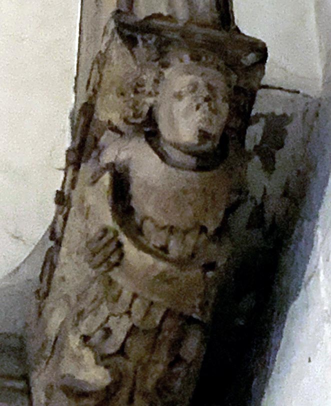Angel singing from open music book