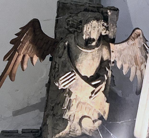 Angel holding scroll