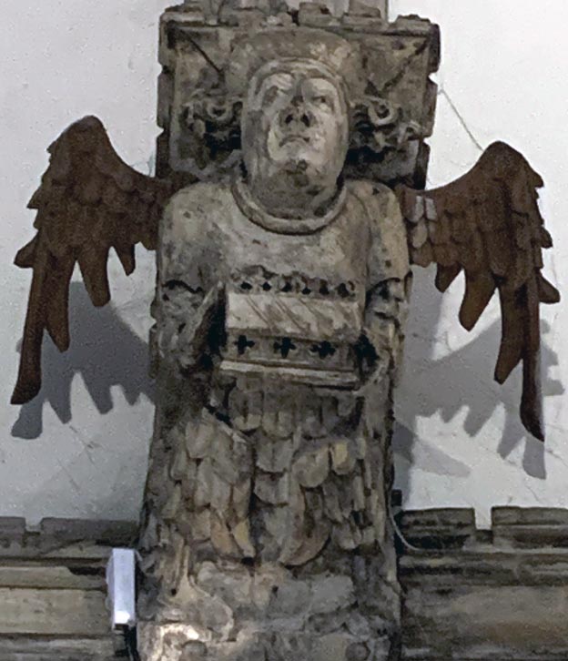 Angel holding reliquary