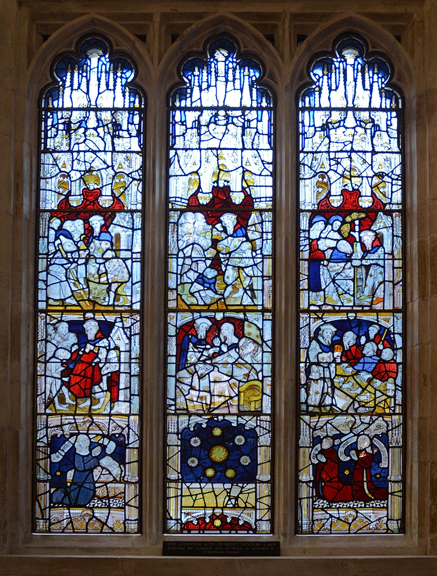 Corporal acts of mercy window